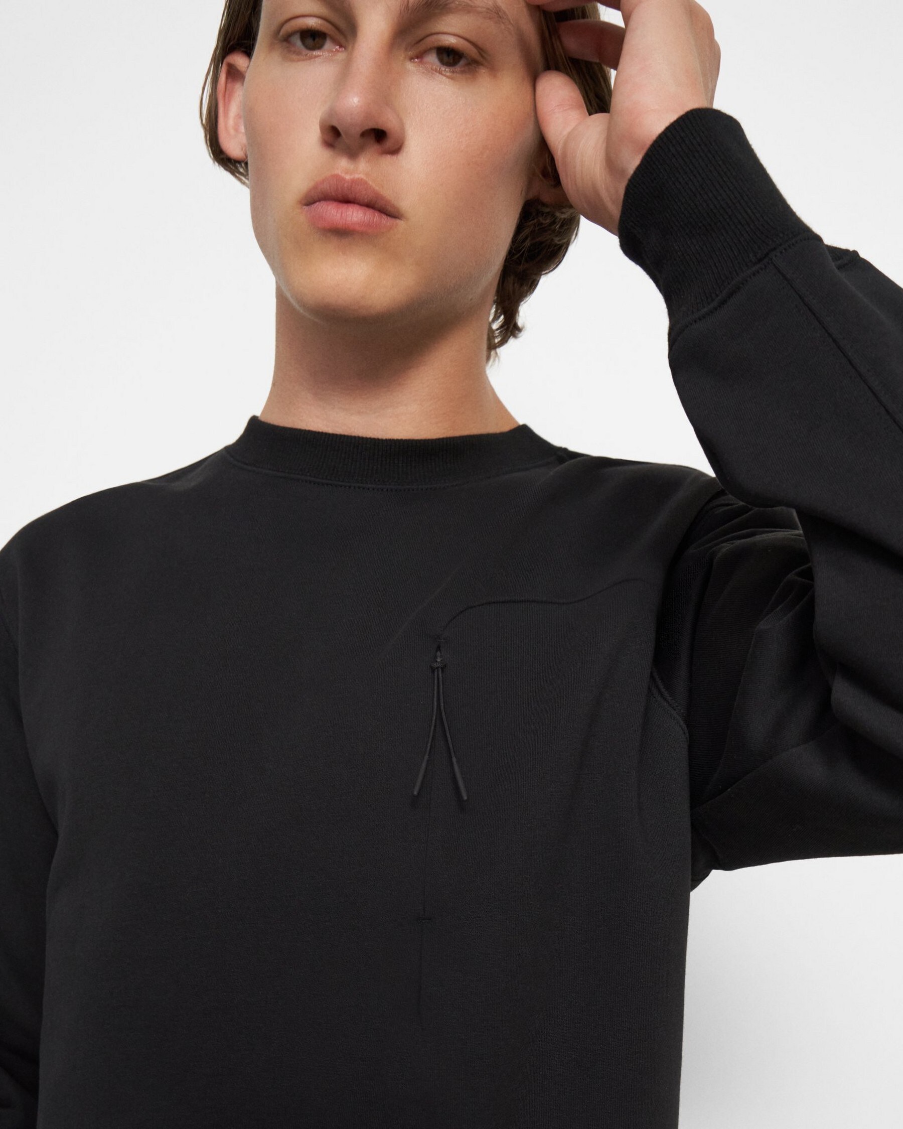 Sweatshirt aus Tech-Terry-Baumwolle mit Reißverschlusstasche