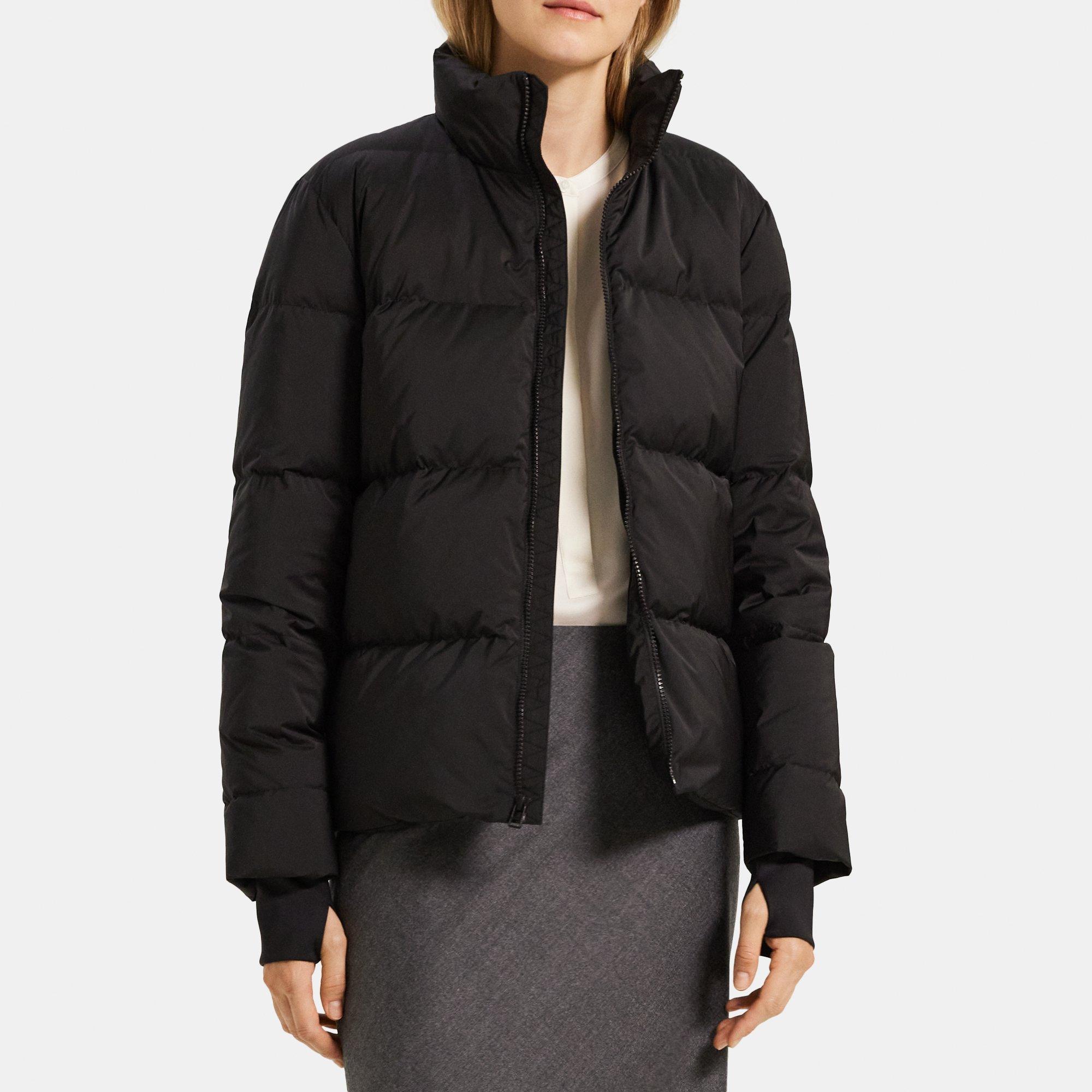 Long stand-collar puffer vest, Contemporaine